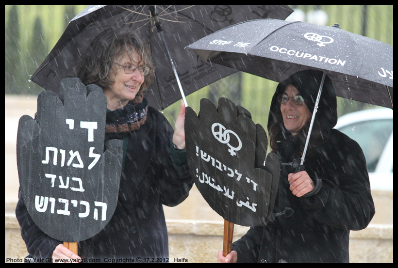 Women in Black, Haifa Feb 17 2012 - Did I say Pouring Rain?? צילום חברתי